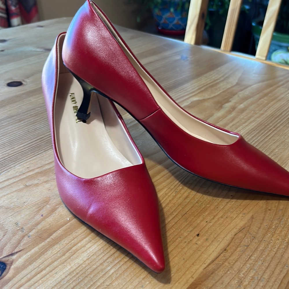 Red leather pumps